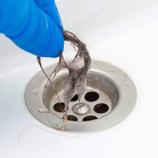 Bathroom Drain Cleaning Portland Or Slow draining shower with water pooling around the drain